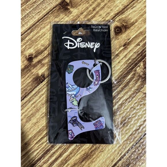 NEW Disney Alice In Wonderland Touch Tool Keychain - Picture 1 of 5